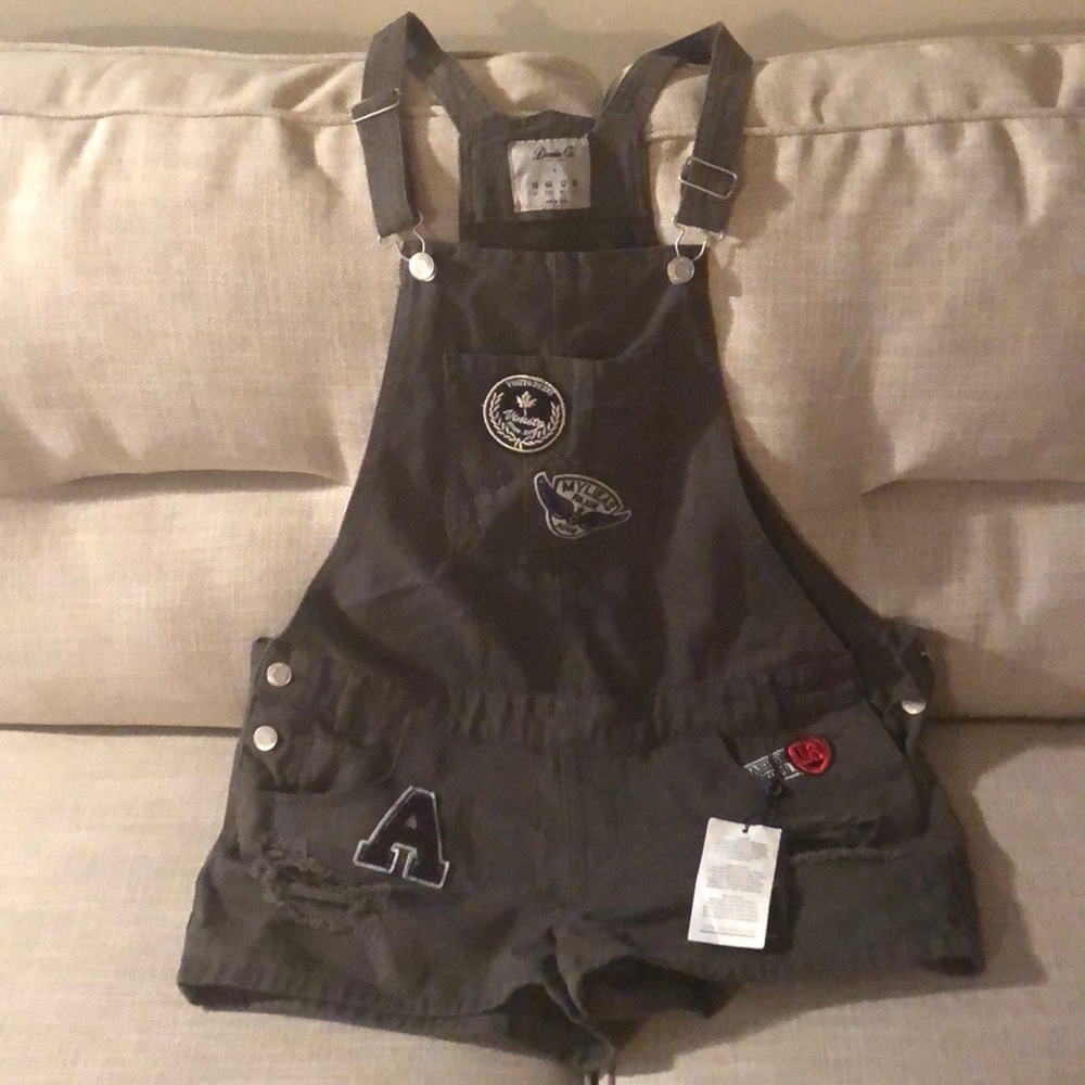 Jean shorts romper. Never been worn!!